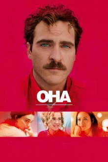 Она